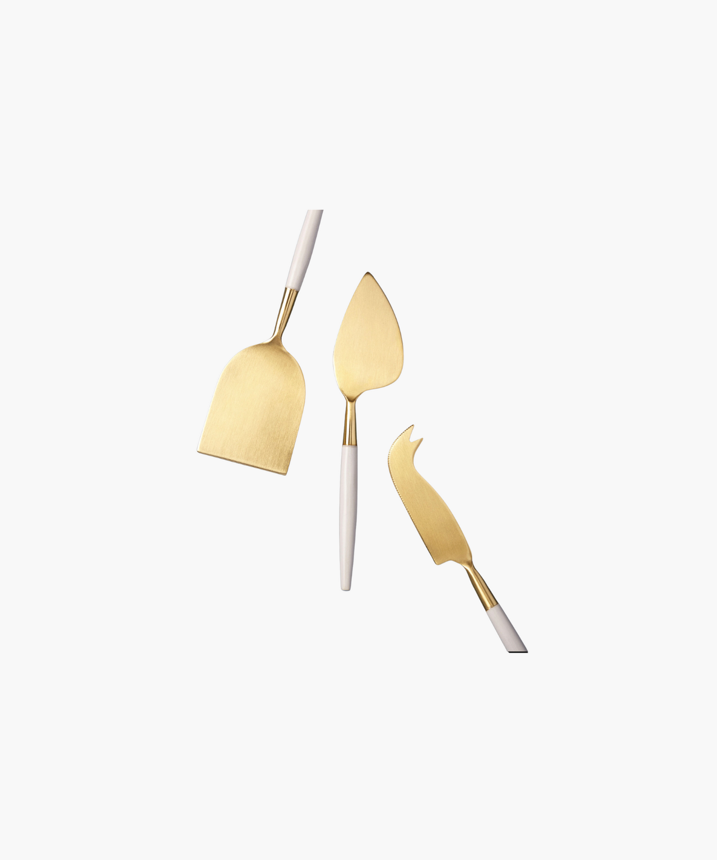 Three elegant cheese knives with gold blades and white handles arranged on a white background, conveying a luxurious and sophisticated tone.