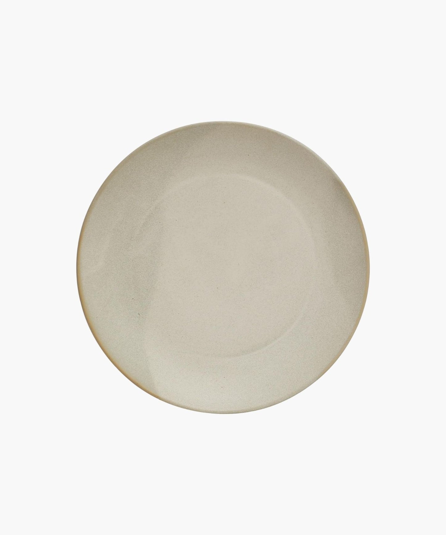 An overhead picture of a minimalist, beige ceramic pedestal serving dish with a wide, flat surface on a sturdy base. It conveys simplicity and elegance in design.