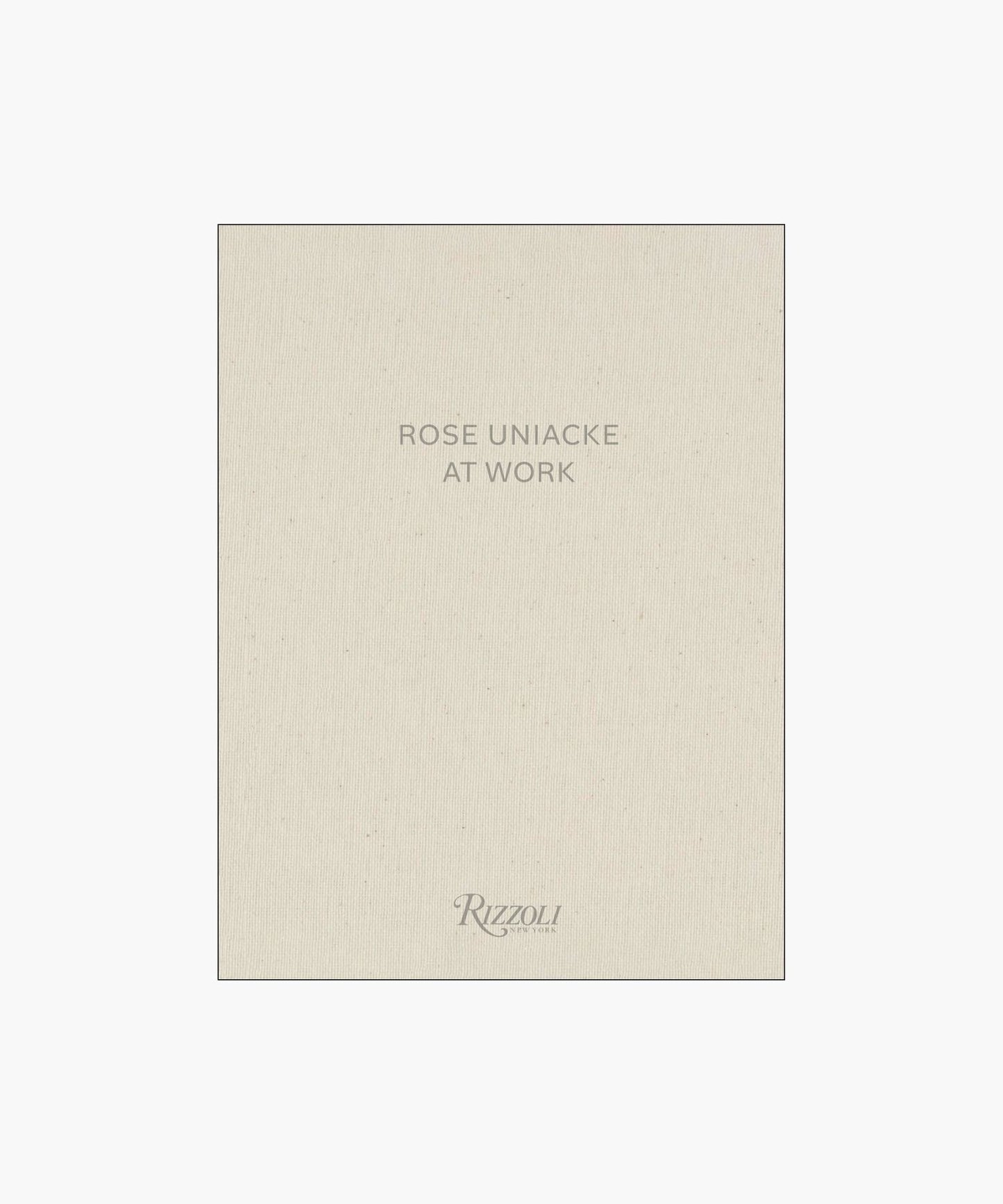 Cover of the book "Rose Uniacke at Work," featuring a minimalist design with beige fabric texture and gray text.