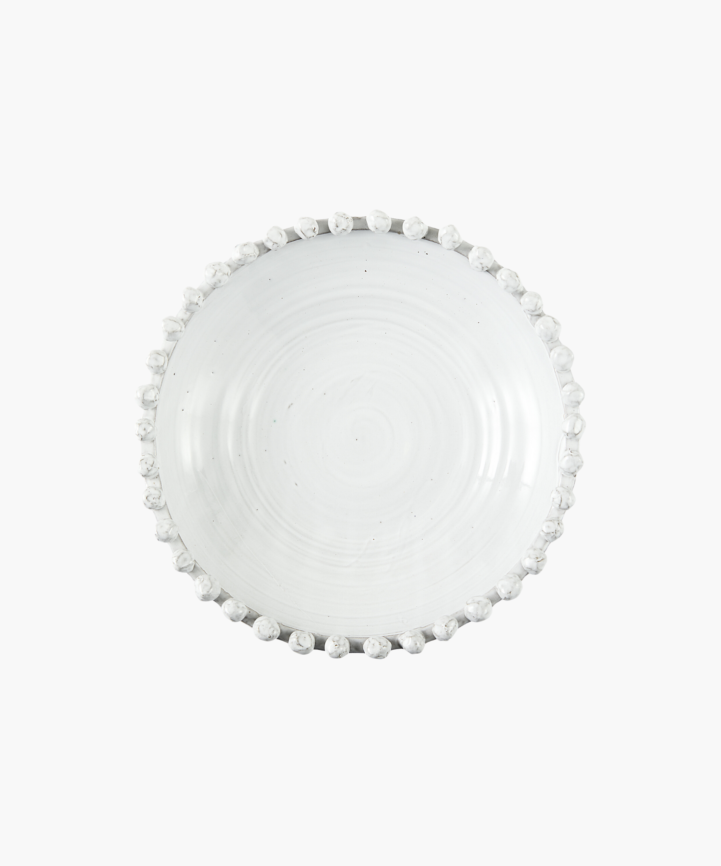 Overhead view of a white ceramic bowl with a smooth finish and decorative round beads along the rim. The bowl is shallow, with an elegant, minimalist design.