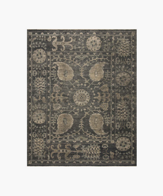 Ornate dark gray rug with intricate floral and paisley designs. Central medallion motif. Elegant, vintage style with a classic, sophisticated tone.