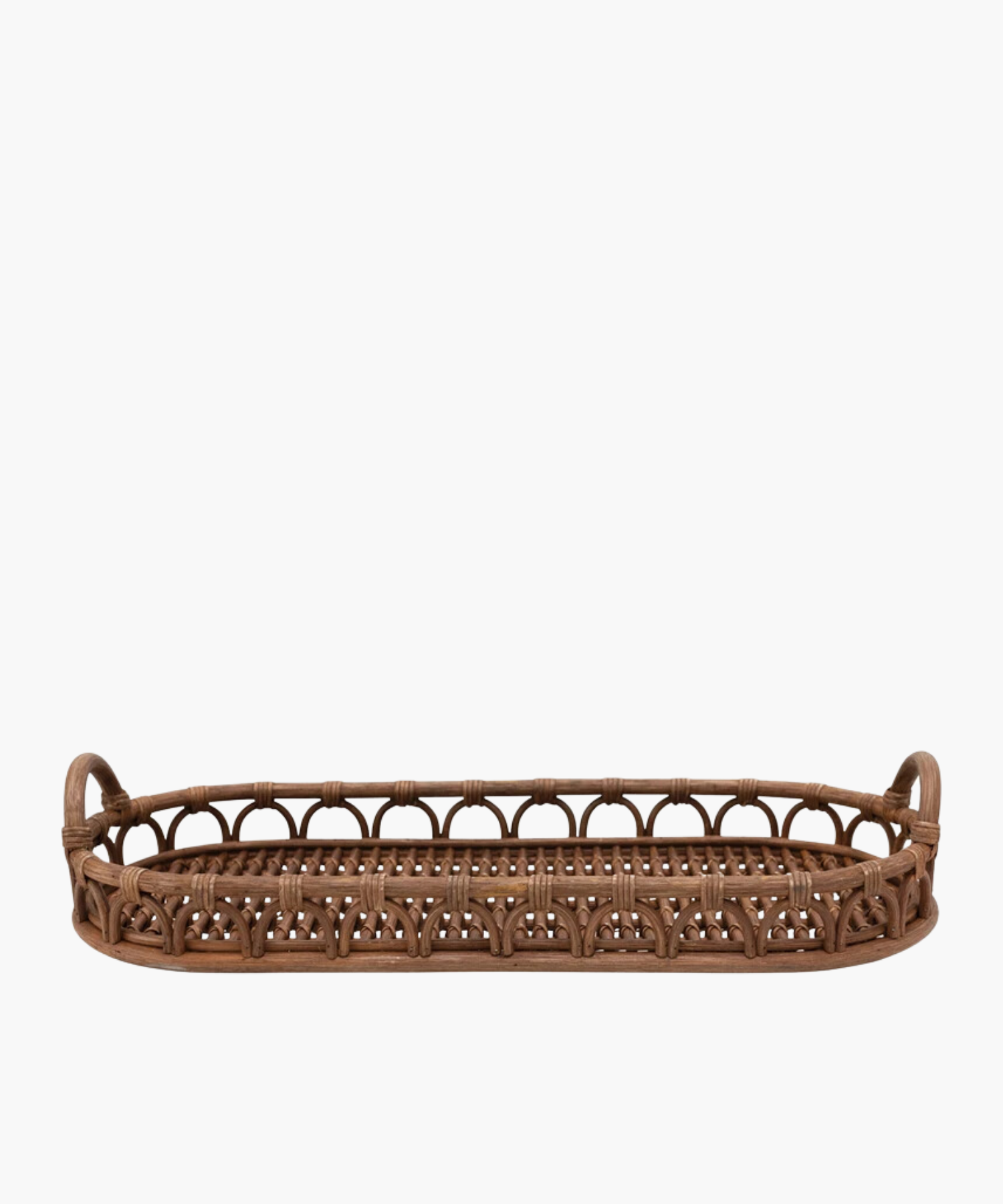 An oval hand-woven rattan tray with rounded handles on each side, featuring an intricate woven pattern. The warm brown color exudes a rustic, natural charm.