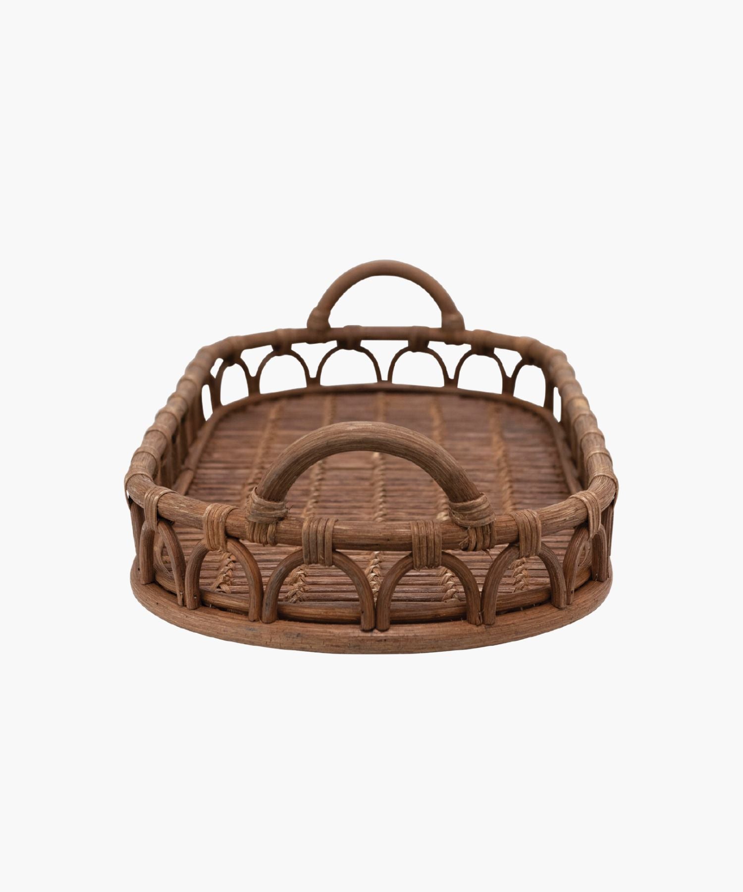 An oval hand-woven rattan tray with rounded handles on each side, featuring an intricate woven pattern. The warm brown color exudes a rustic, natural charm.