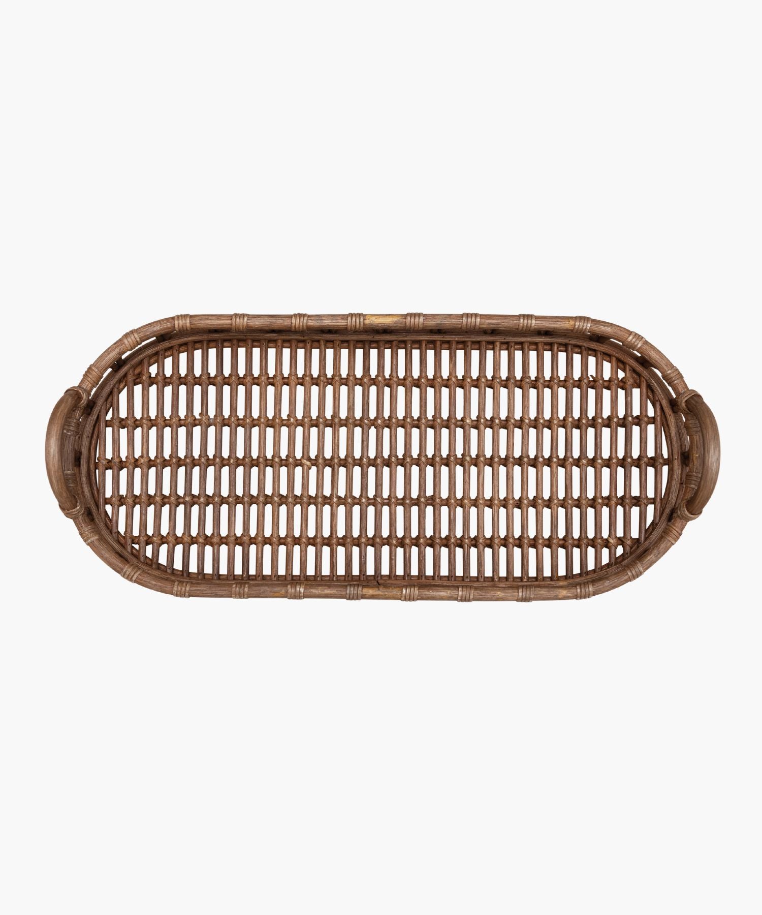 Overhead view of an oval hand-woven rattan tray with rounded handles on each side, featuring an intricate woven pattern. The warm brown color exudes a rustic, natural charm.