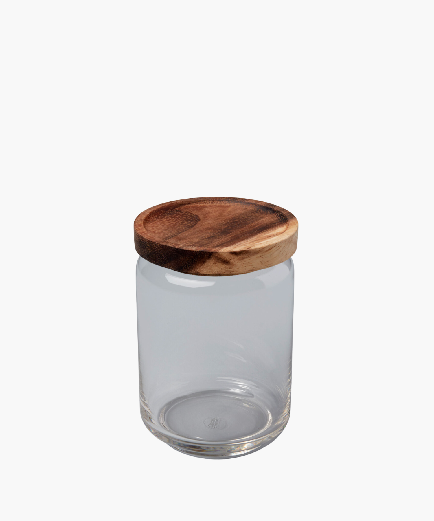 A clear glass jar with a round, smooth wooden lid sits against a white background. The simple, functional design conveys a minimalist aesthetic.