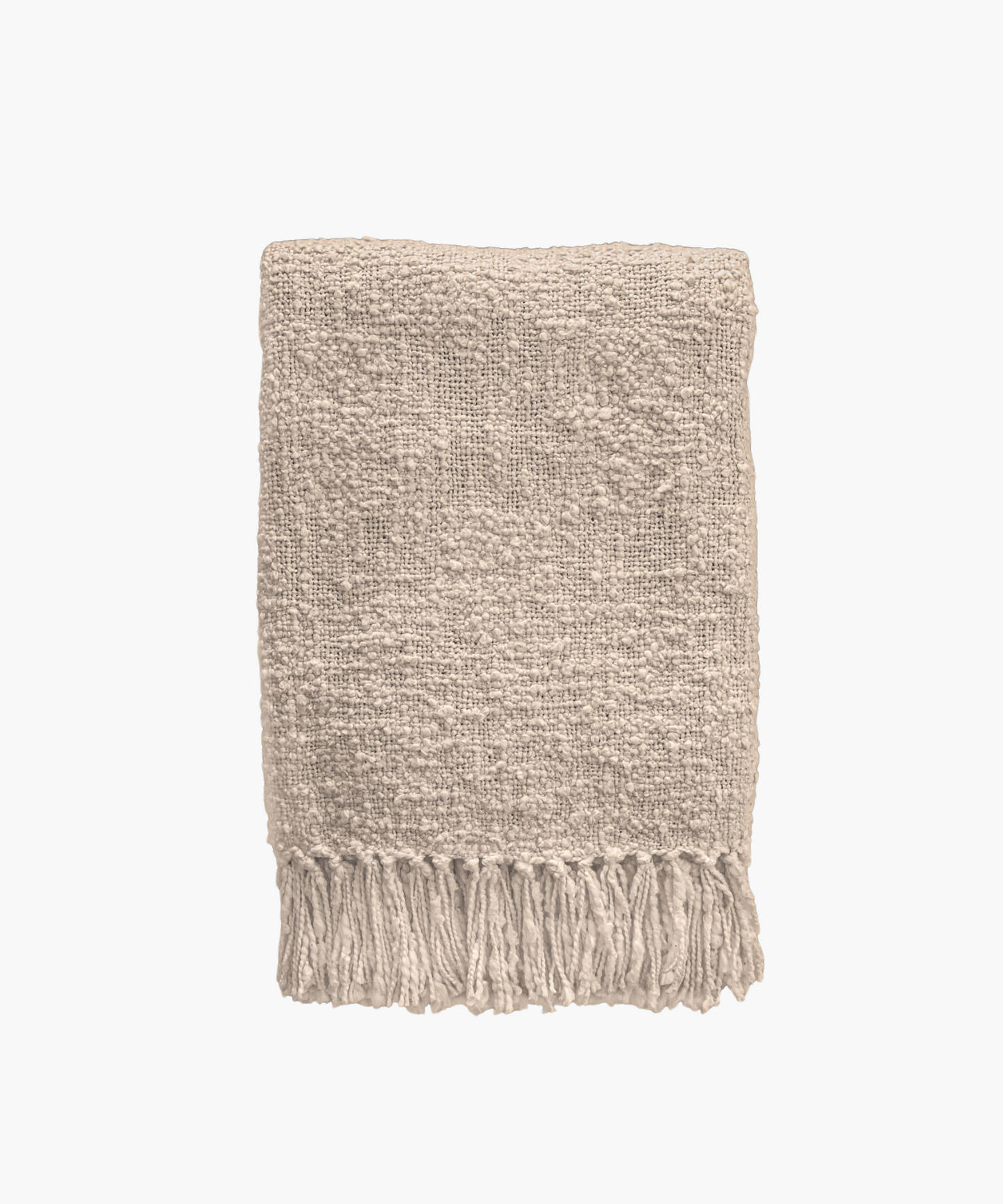 A beige colored woven throw blanket with a textured pattern and fringed edges, conveying a cozy and inviting feel. 