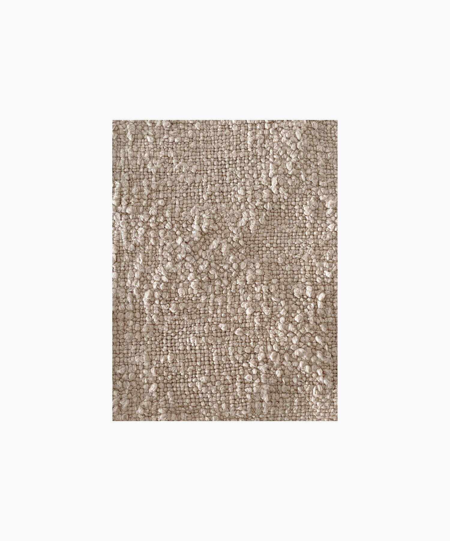 A beige colored woven throw blanket highlighting the textured pattern and color conveying a cozy and inviting feel. 