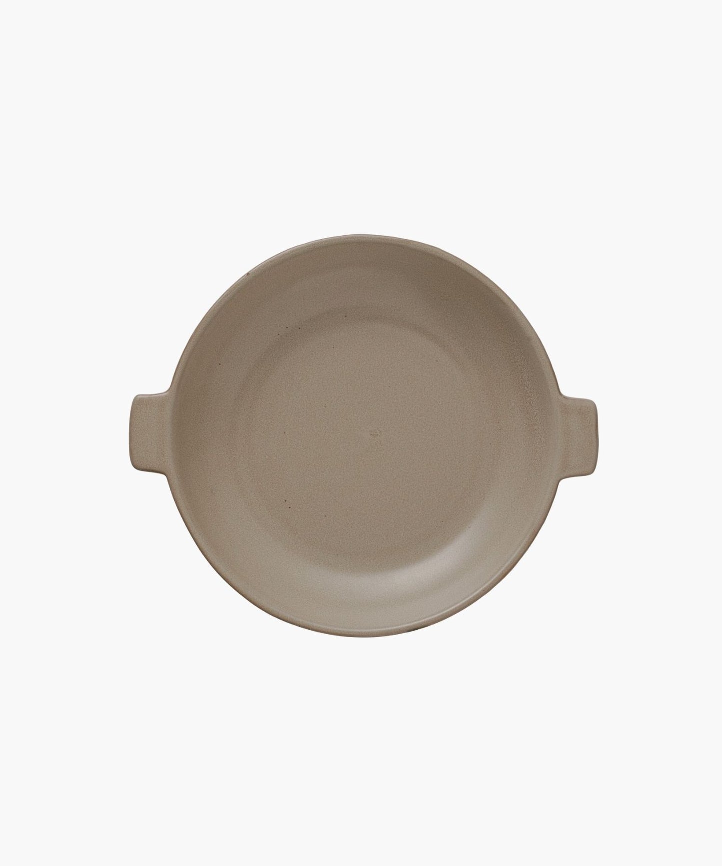 A round, beige ceramic plate with two small handles on opposite sides is centered against a plain white background, conveying simplicity and elegance.