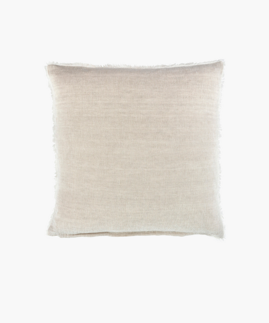 A natural linen square pillow with a smooth texture and slightly frayed edges. The neutral tone conveys simplicity and elegance, suitable for minimalistic decor.