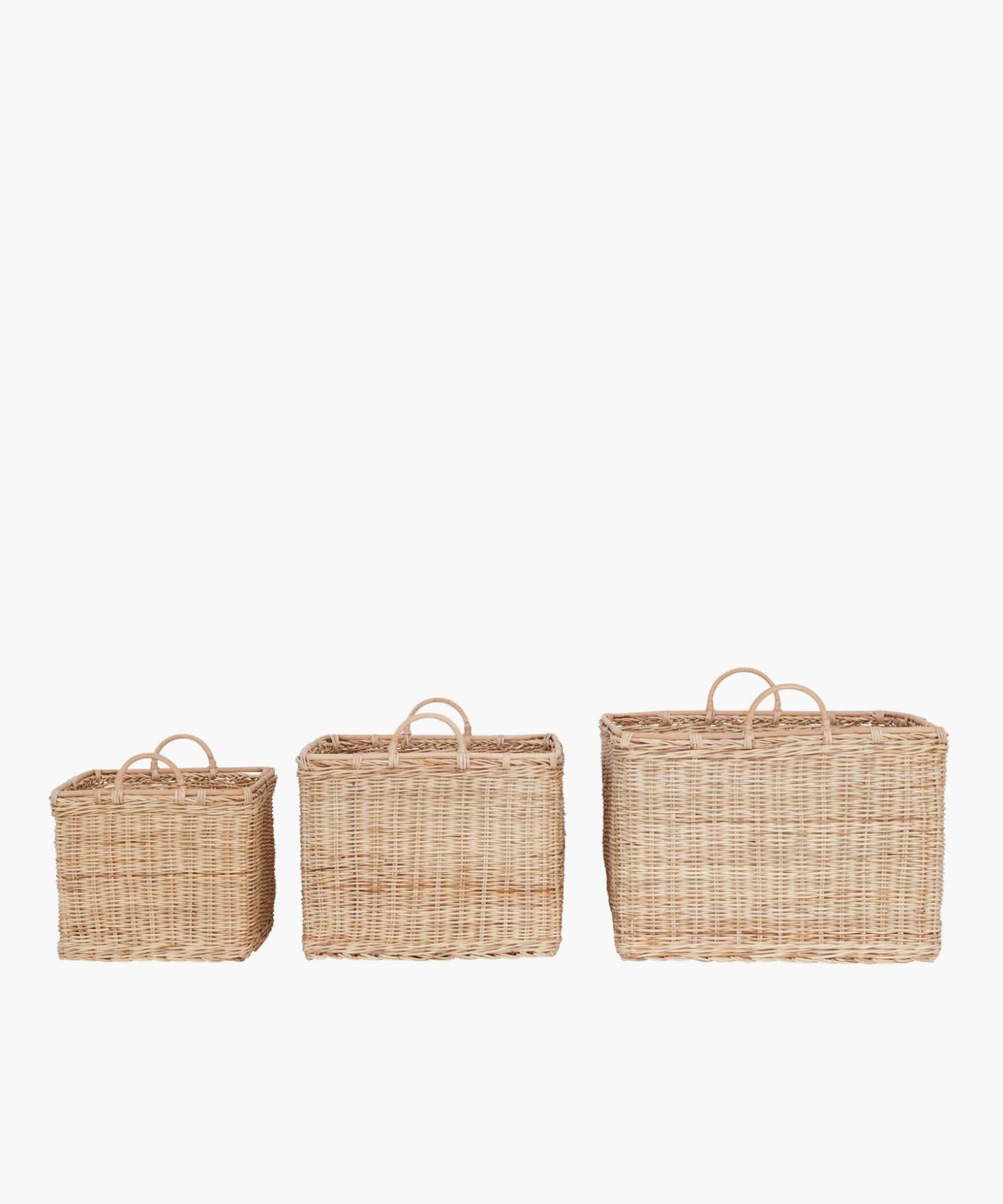 Square rattan baskets with two rounded handles in a natural finish in 3 sizes. The light brown weaving creates an earthy, natural look suitable for storage or decor.