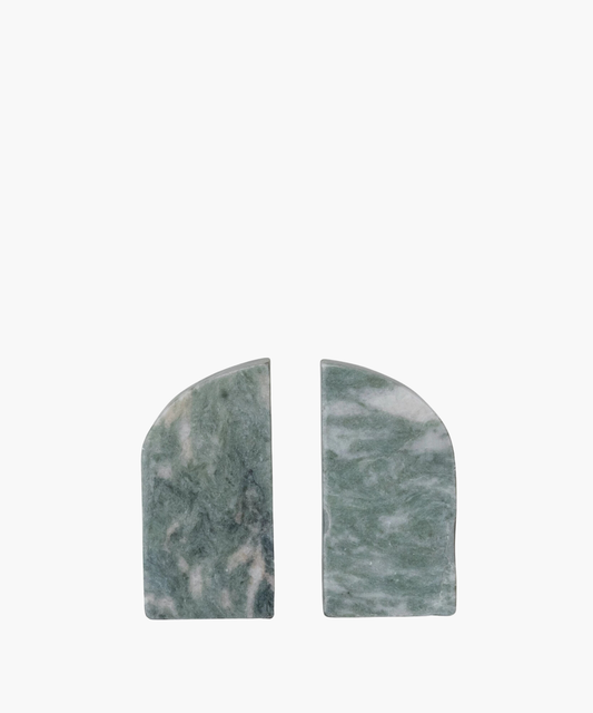 Two green marble bookends with rounded tops and white marbling. They are placed side by side against a plain white background, conveying elegance and simplicity.