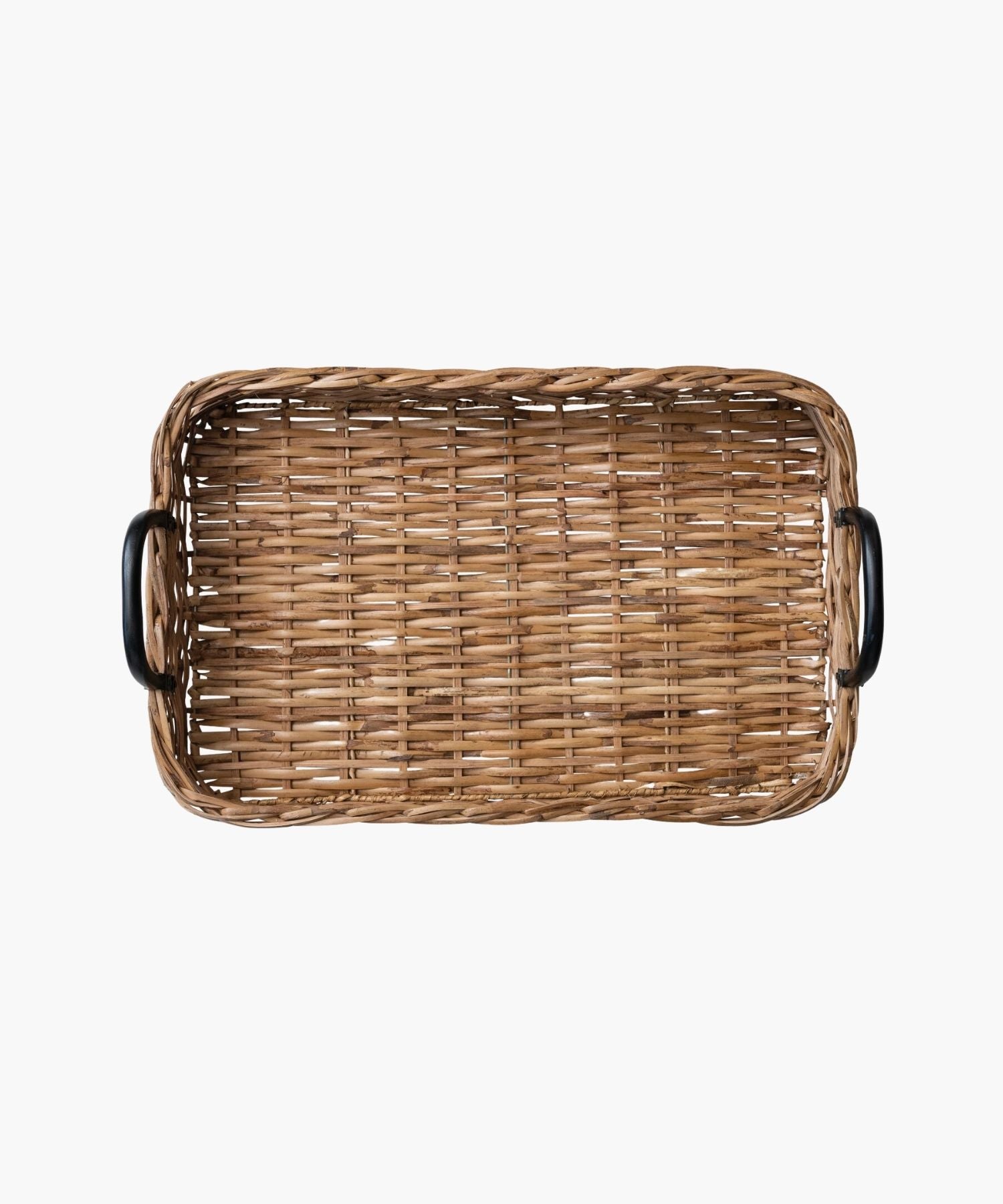 Overhead view of a rectangular woven rattan tray or basket with a natural brown finish features black metal handles on both ends. The style is rustic and earthy.