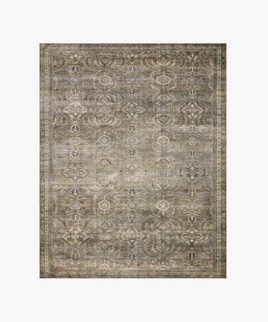 Elegant, vintage-style rug with a floral medallion pattern in muted browns and grays. The distressed texture adds an antique, rustic charm.