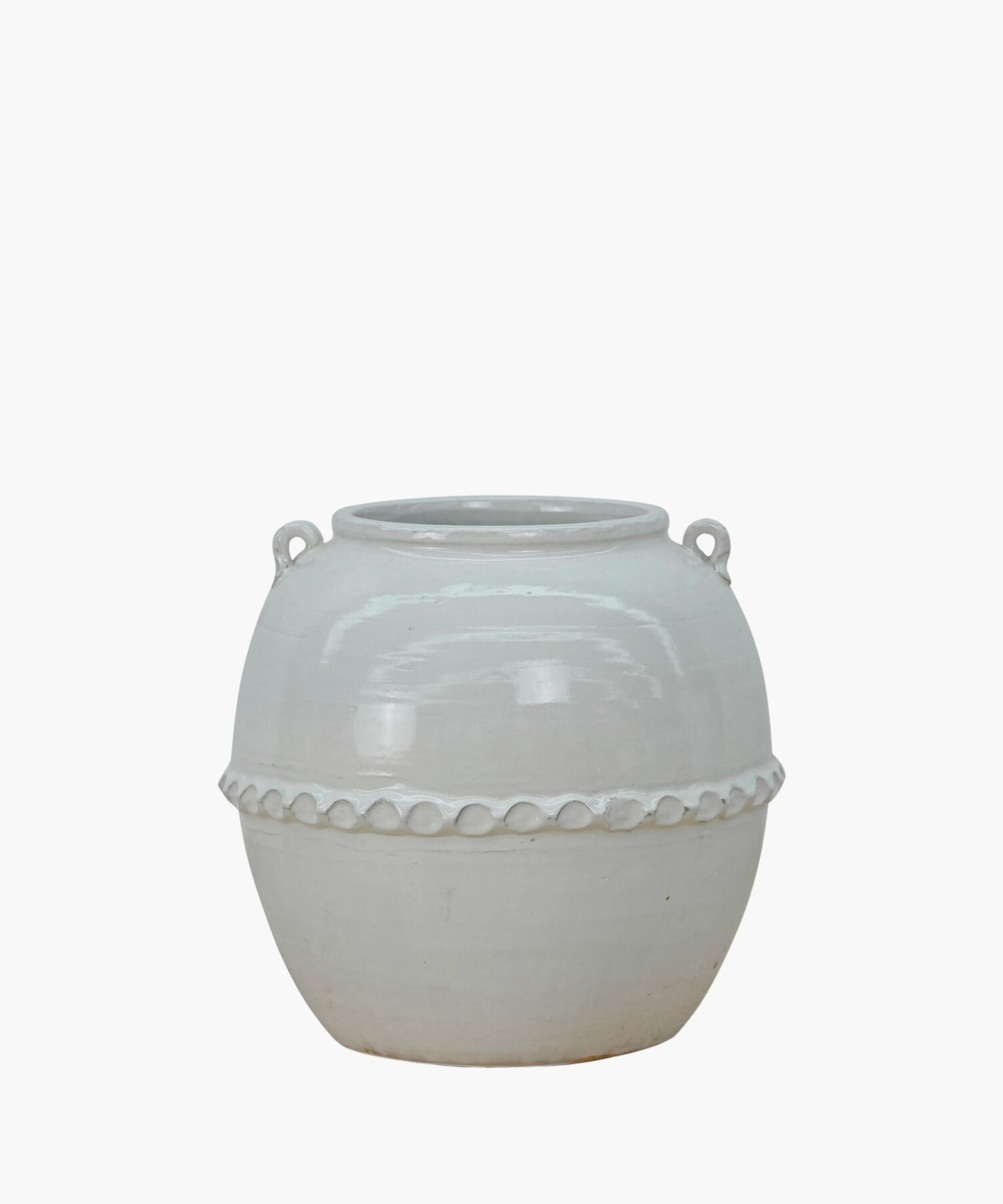 A white ceramic pot with a glossy surface and rounded shape. It features a decorative band with a loop design near the top, giving an elegant look.