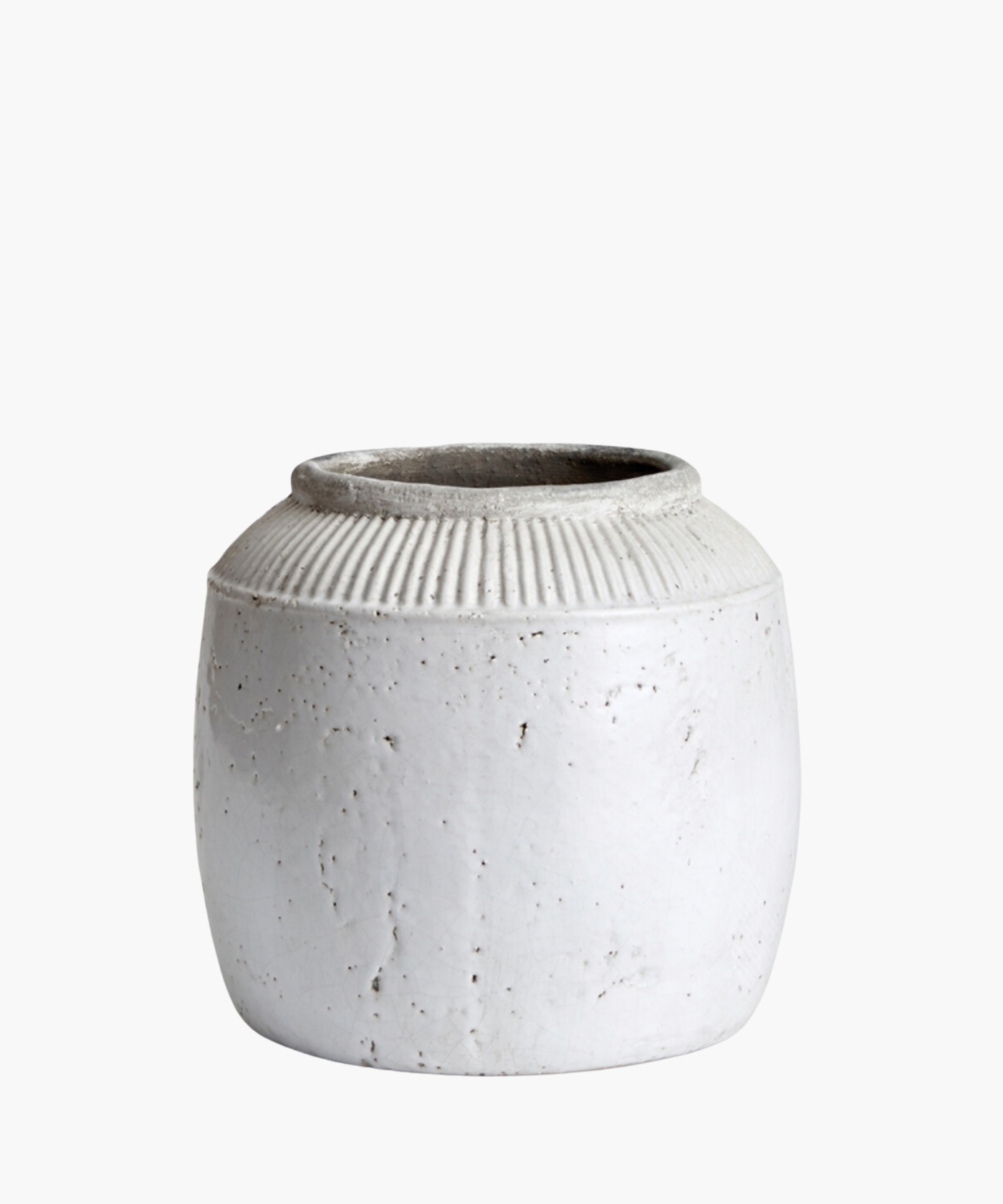 A large textured white ceramic pot with a round body and a narrow opening. The pot has subtle vertical ridges near the top.