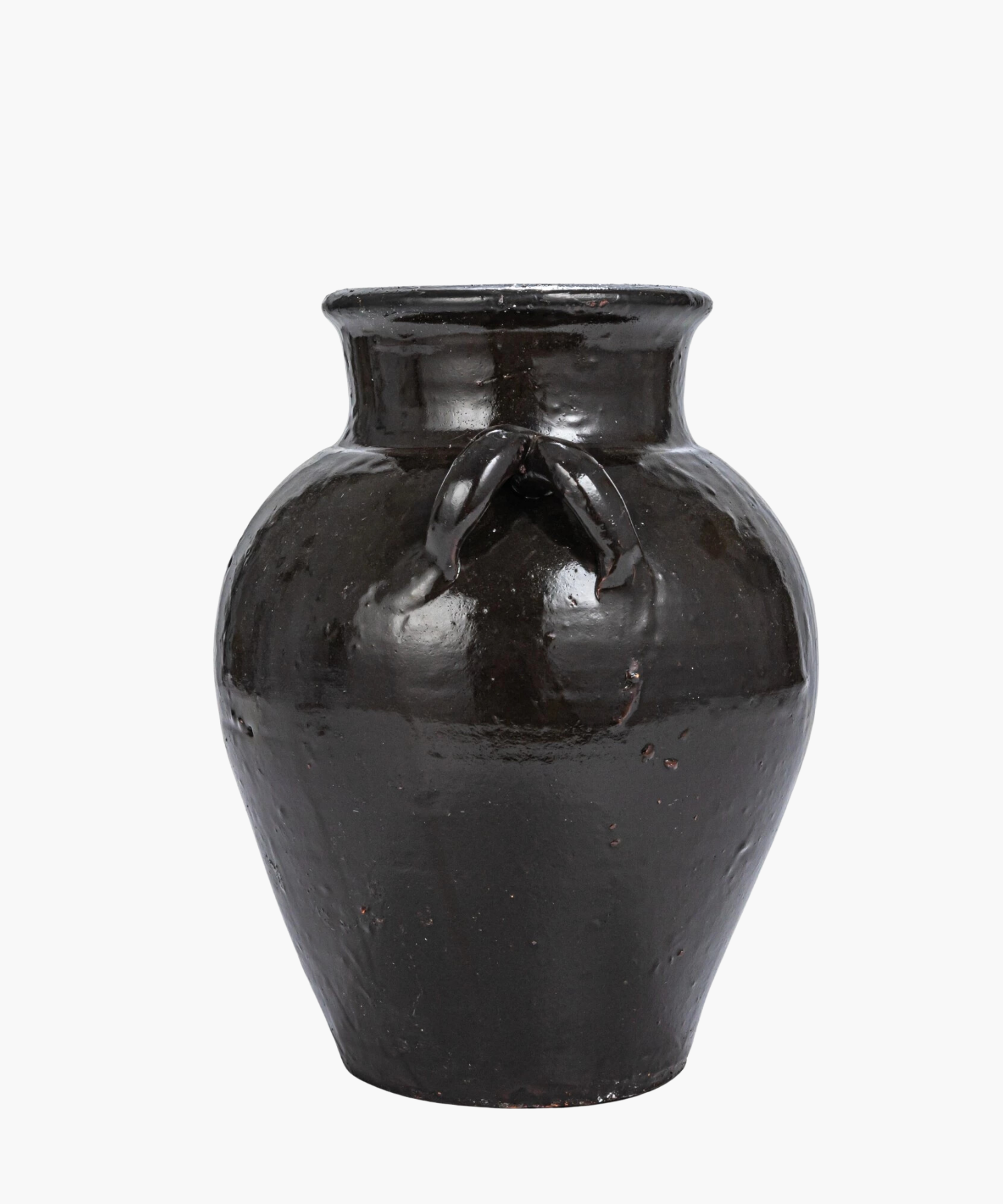 A large, glossy, black ceramic vase with two small side handles. The vase has a rounded body and a narrow neck, evoking an antique feel.