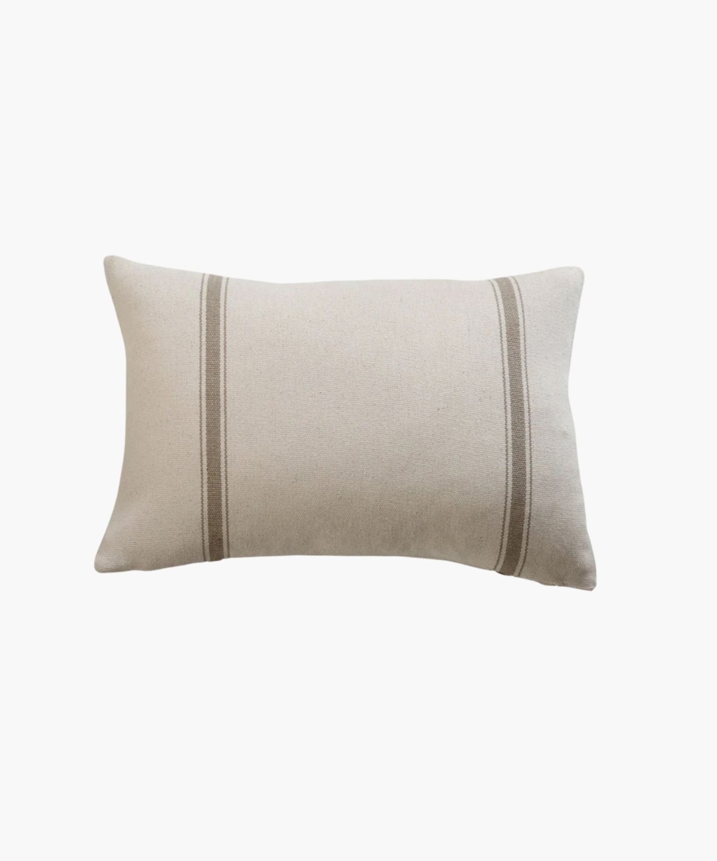 A rectangular or lumbar pillow cover with two vertical, parallel tan stripes on a natural cotton fabric background. The style is minimalistic and cozy, conveying simplicity and comfort.