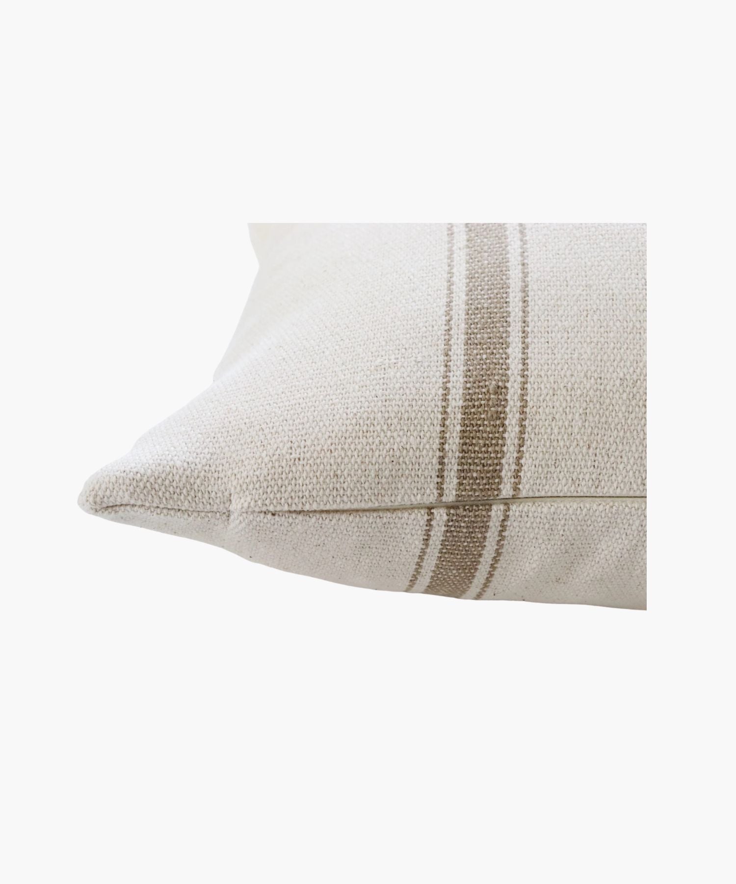 A close up of a pillow cover with two vertical, parallel tan stripes on a natural cotton fabric background. The style is minimalistic and cozy, conveying simplicity and comfort.