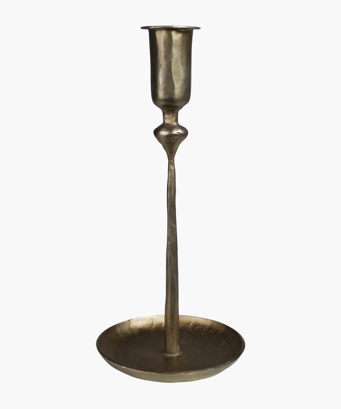 Antique inspired brass plated candle holder with a textured surface sitting on a circular base. 