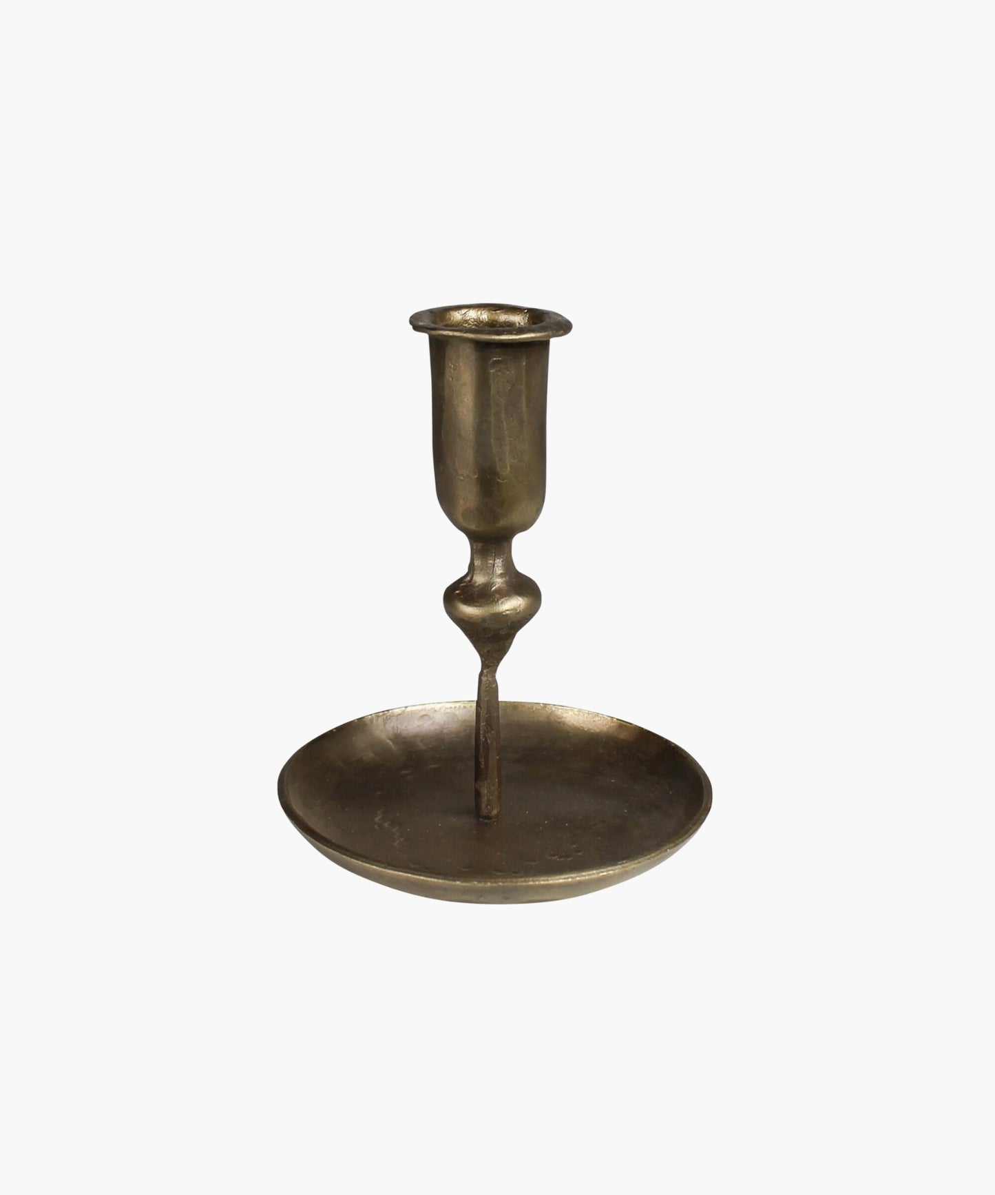 Antique inspired brass plated candle holder with a textured surface sitting on a circular base. 