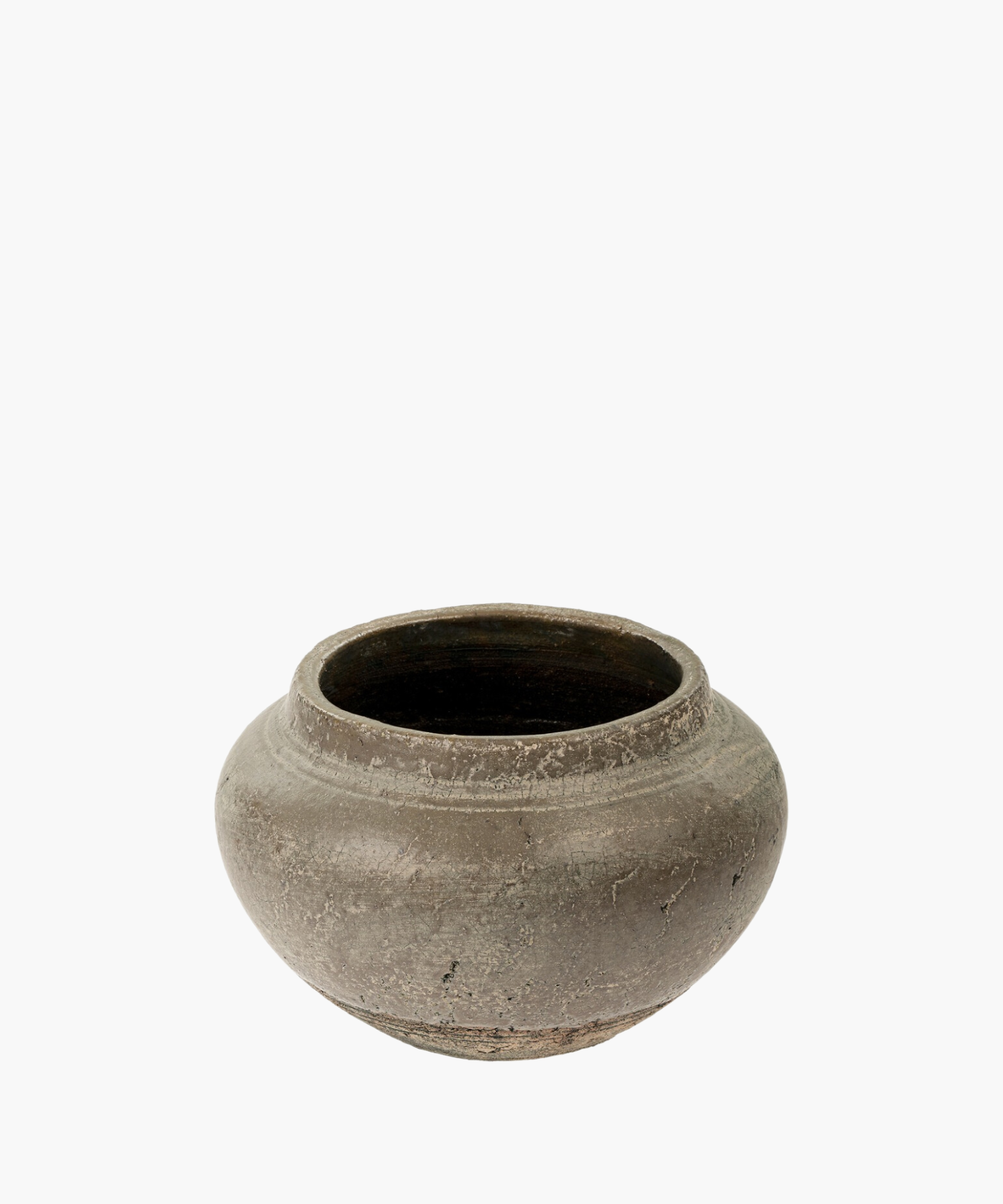 A round, weathered clay vase with a wide opening and decorative horizontal ridges. The vase conveys an earthy, rustic, and historical feel.