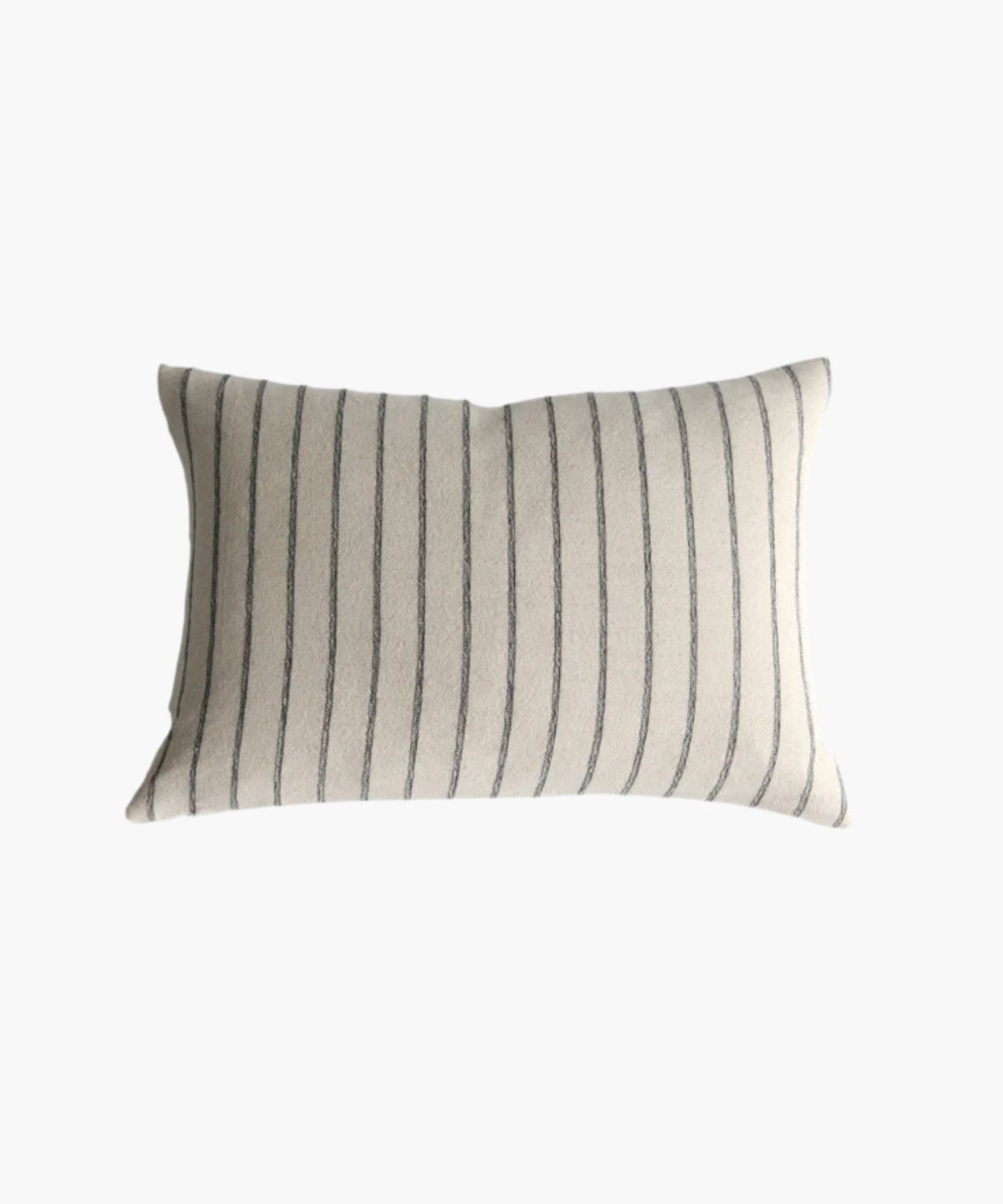 A rectangular or lumbar pillow cover with vertical black  woven stripes on a cream background. The pattern is simple and elegant, conveying a calm and cozy atmosphere.