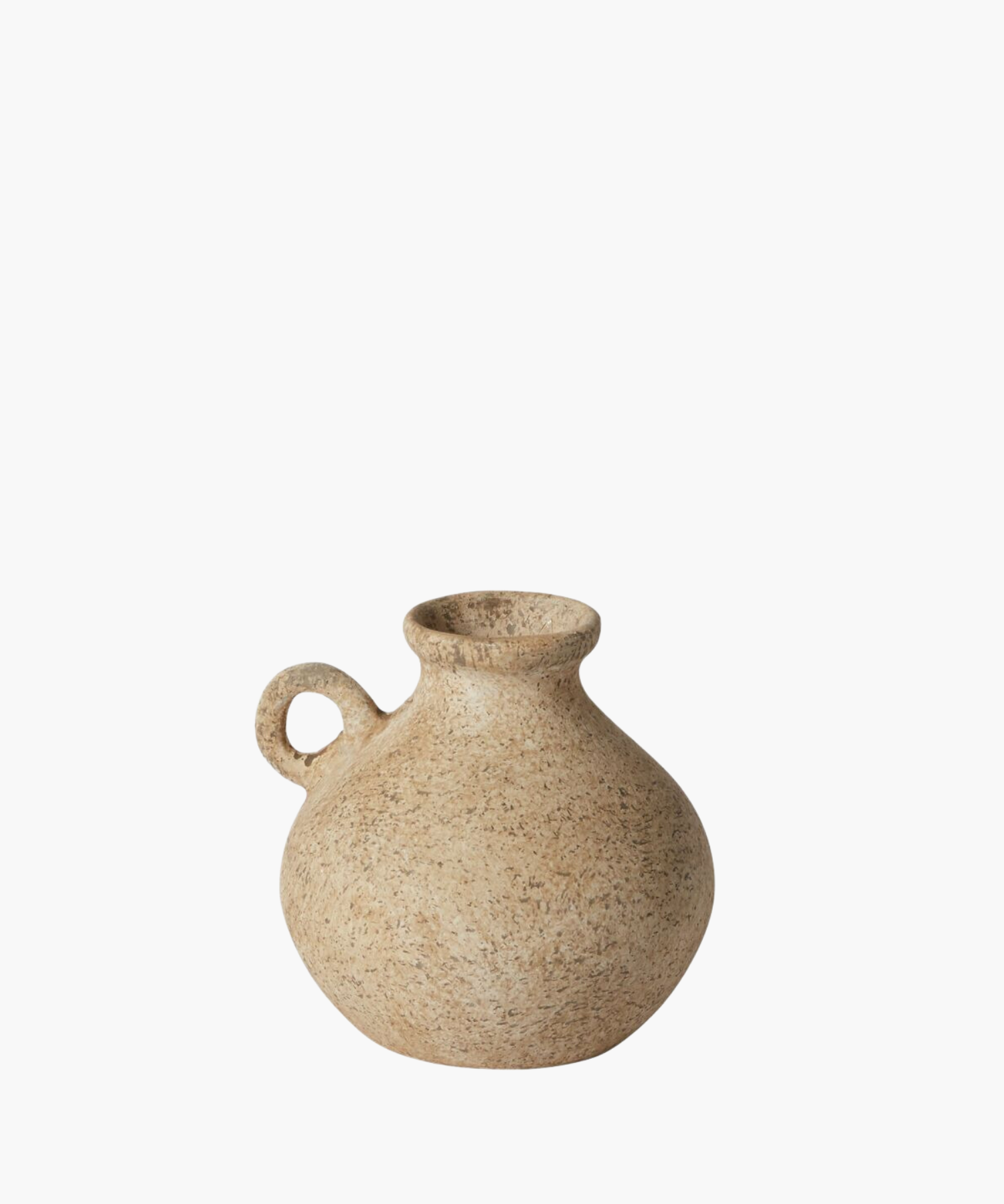 A rustic, beige ceramic jug with a round body and a small circular handle. Its textured surface gives an earthy, vintage appearance.