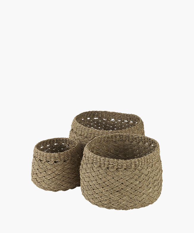 Three woven baskets in various sizes with a natural, textured appearance. The intricate zigzag pattern in earthy tones suggests rustic charm and simple elegance.