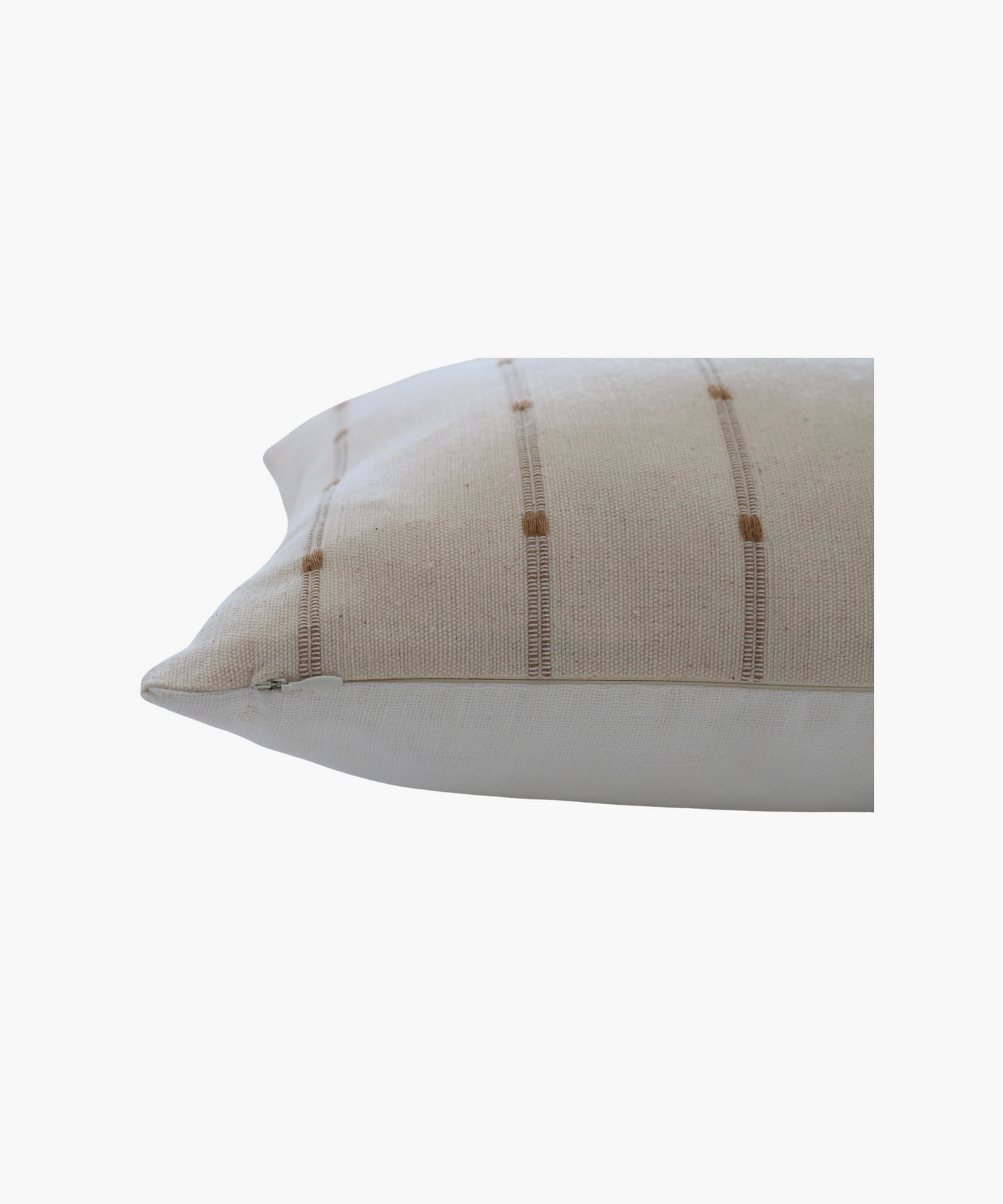 Detailed picture of a beige  pillow highlighting its minimalist pattern of thin, vertical brown lines and small dots, creating a calm and modern appearance.