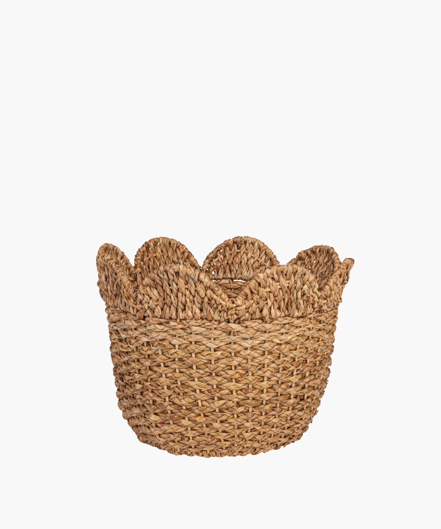 Woven basket with a scalloped edge in natural straw color. The texture is coarse, conveying a rustic and earthy tone.