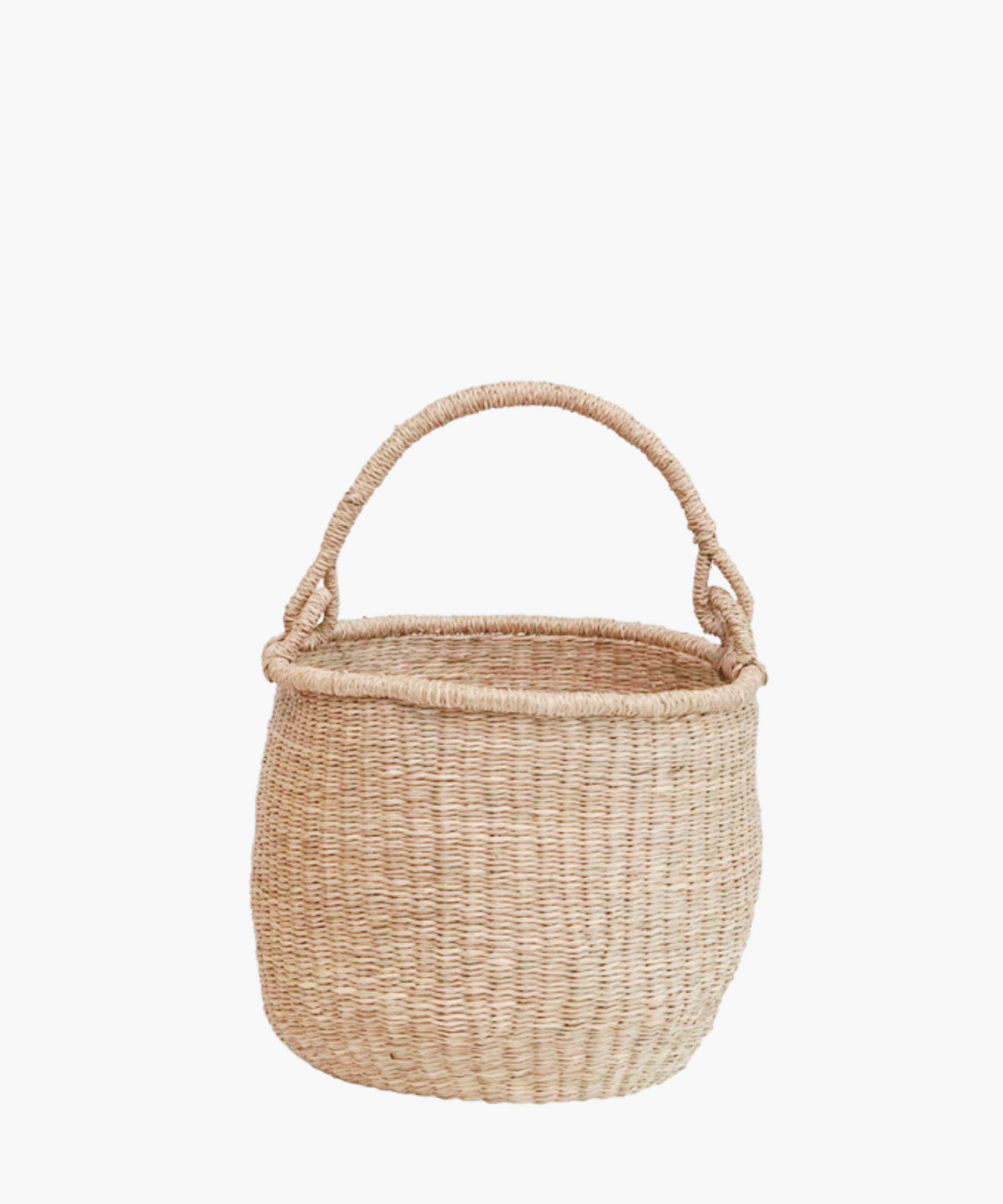 Small hand-woven seagrass basket with sturdy handle, showcasing natural beige tone. 