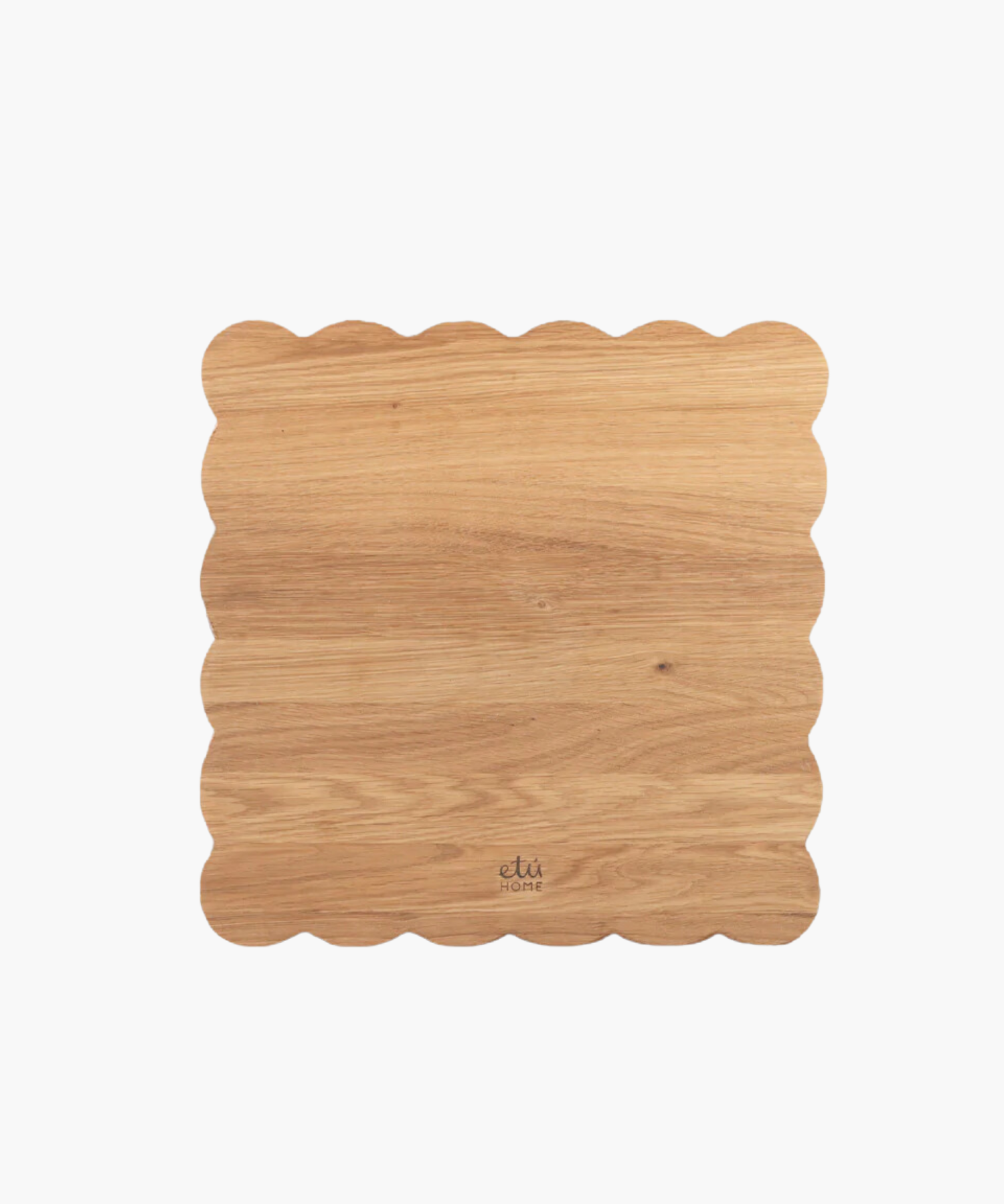 Scalloped-edge wooden cutting board with a light oak finish.