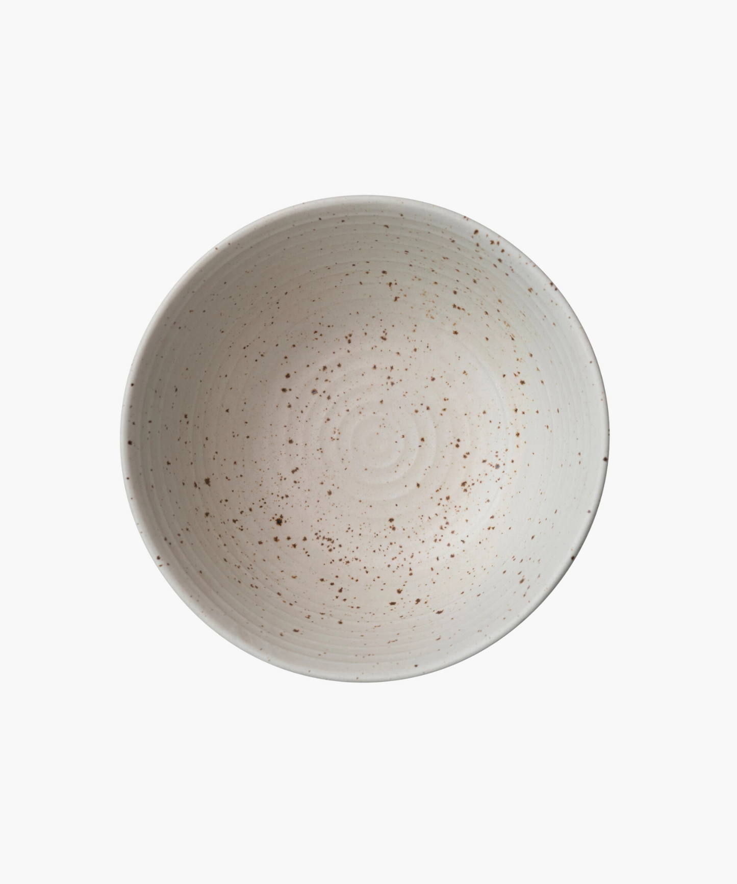 An overhead picture of a beige ceramic bowl with a speckled pattern and a smooth, rounded shape. The bowl's minimalistic design conveys a rustic, handcrafted aesthetic.