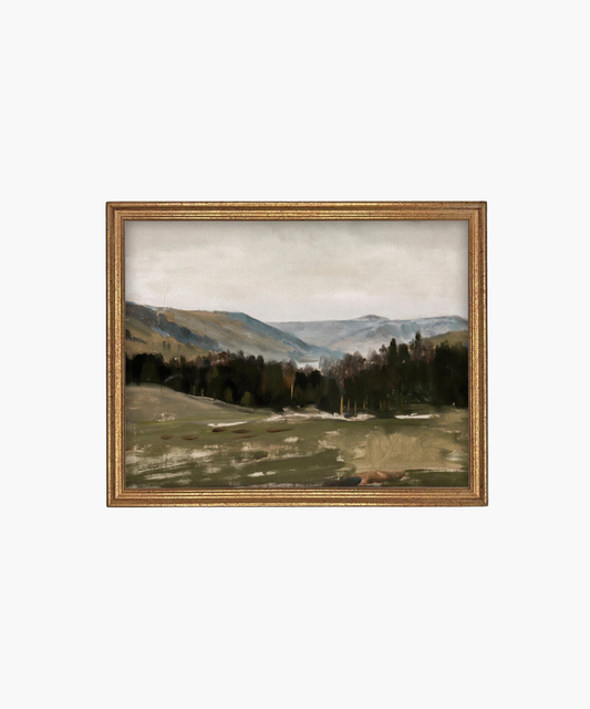 Framed landscape painting of rolling hills, distant mountains, and a forest under a cloudy sky. The scene conveys a peaceful, serene atmosphere.