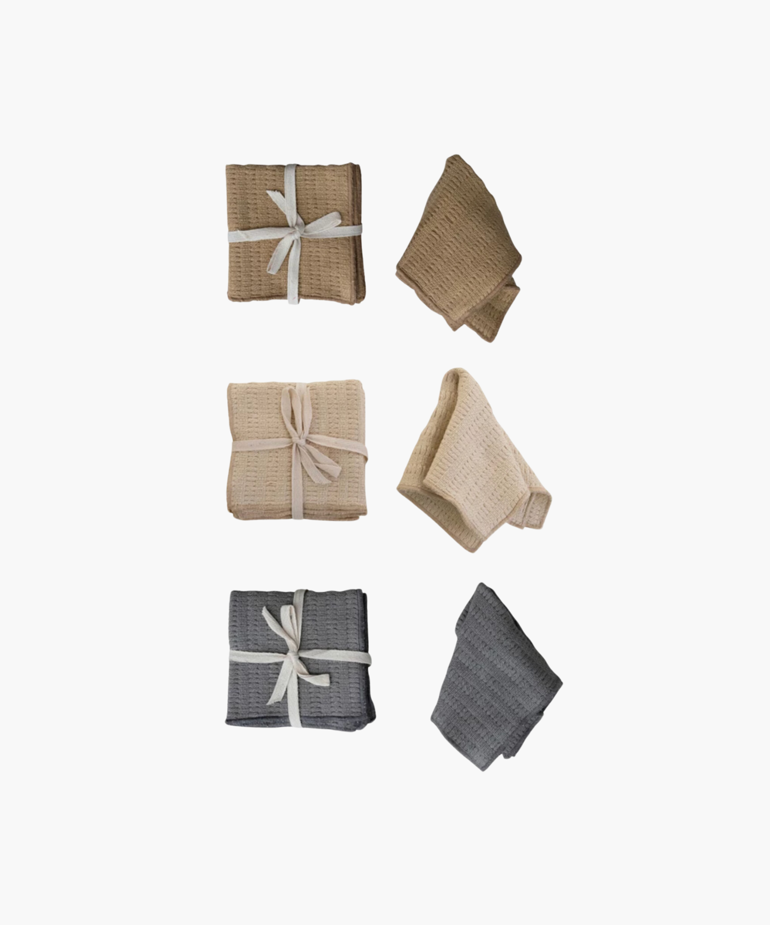 Three pairs of folded, textured dish cloths in brown, ivory, and blue are displayed. Each pair features one tied with ribbon and one unfolded. Cozy and soft appearance.